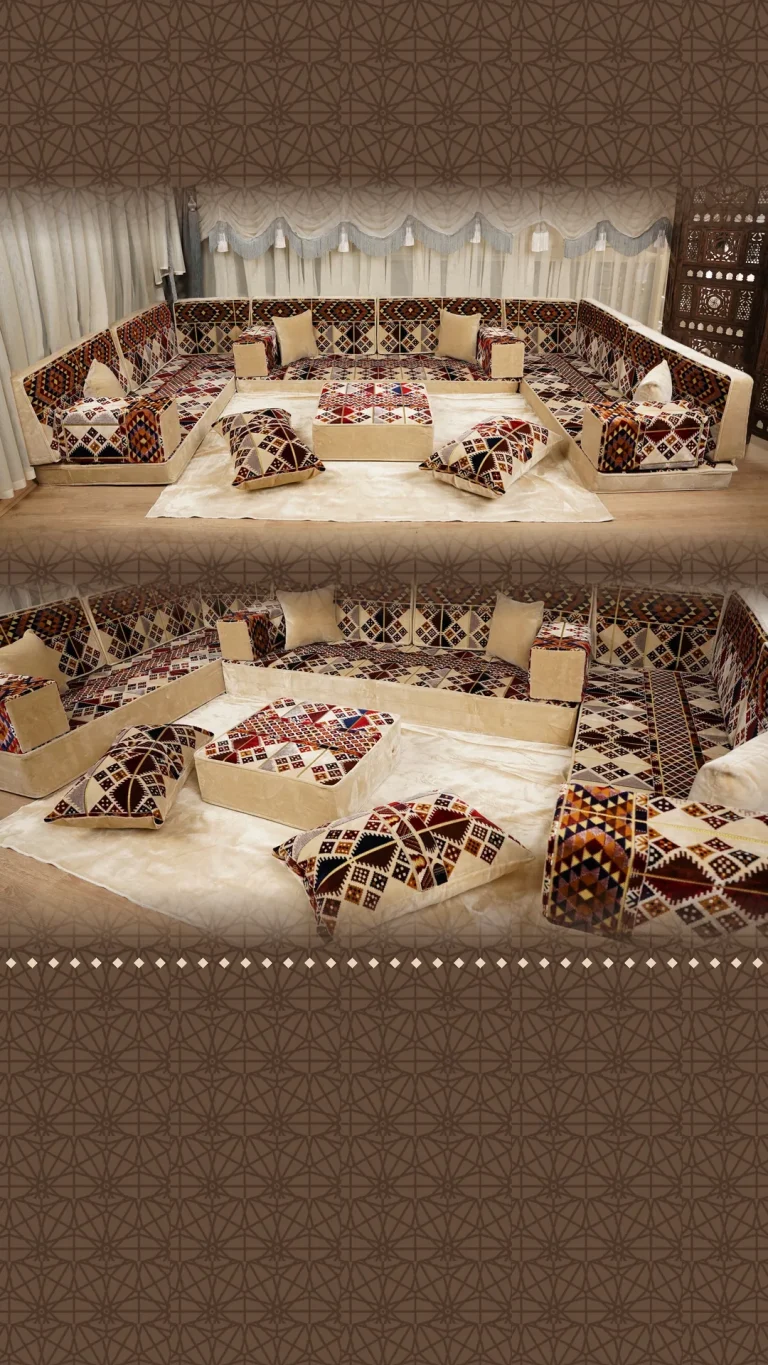 Beige velvet floor sofa set in a U shape with brown, red and navy patchwork-triangle cushions and a matching pouf