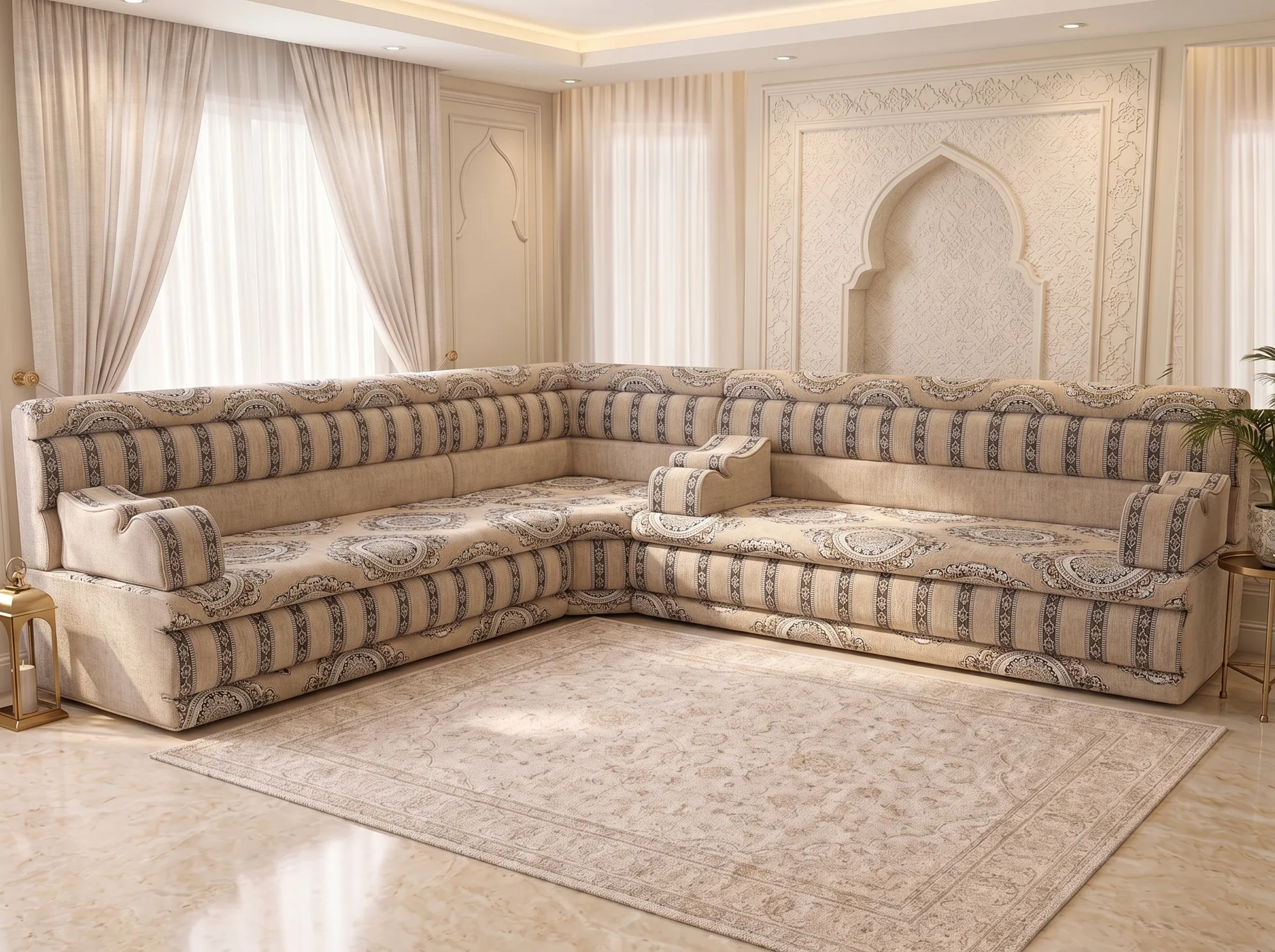 L-shaped beige Arabic majlis with medallion seats and charcoal-striped backrests on a marble floor