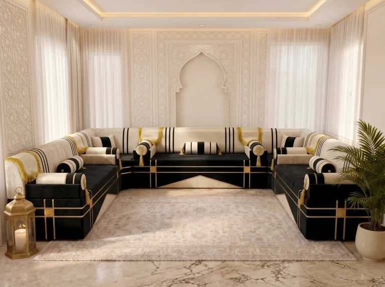 Front view of a U-shaped black and cream majlis sofa set with striped bolsters and square cushions