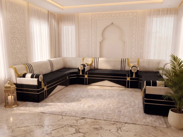Three-quarter view of a black and cream Arabic majlis lining three walls of a room with a cove-lit ceiling