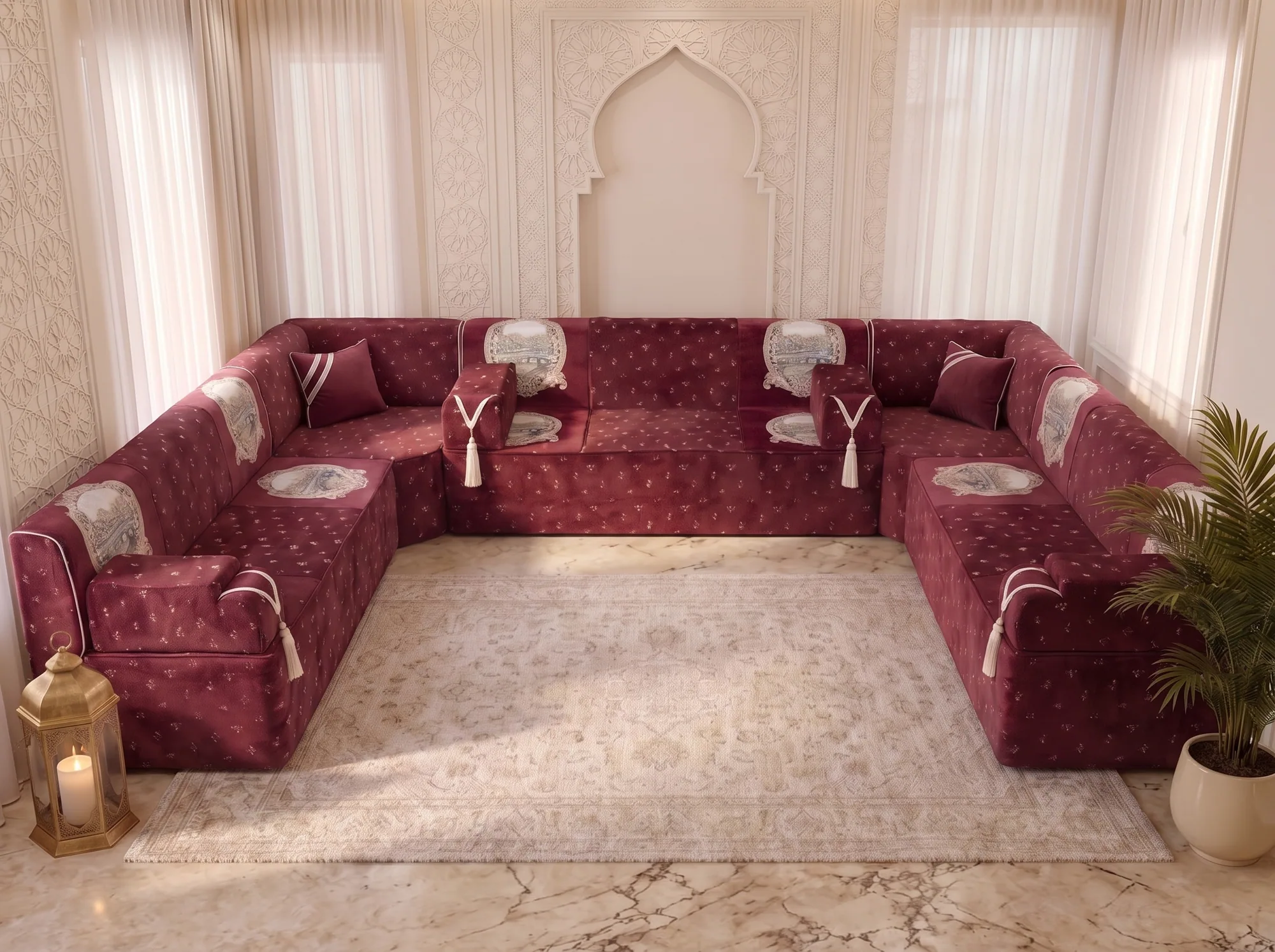 Elevated front view of a burgundy velvet Arabic majlis in a U shape with tapestry panels on every seat