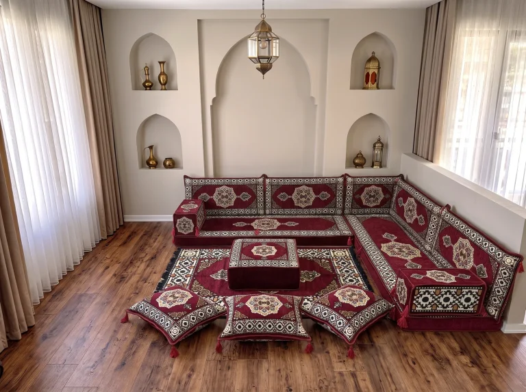 Burgundy medallion-pattern floor sofa set in an L shape with matching rug, ottoman and three floor cushions