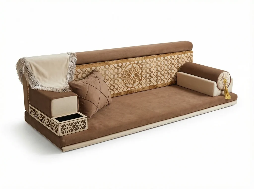 Caramel suede-look majlis seating piece with a gold lattice back panel, pierced tray armrest and cream throw