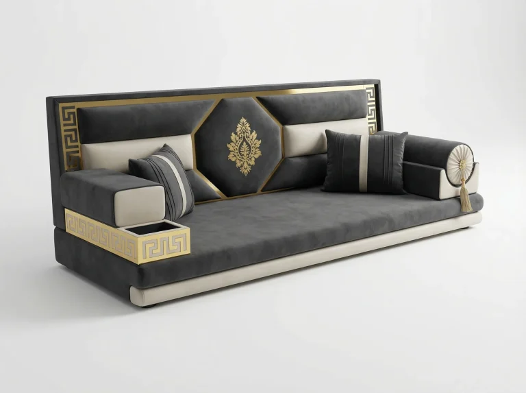Charcoal and cream velvet majlis sofa with a gold-framed octagonal back panel and a gold key-pattern tray armrest