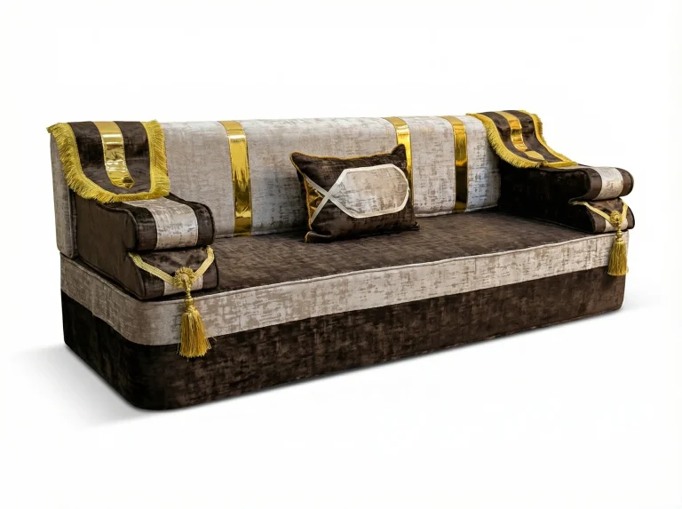 Chocolate brown and silver-beige crushed velvet majlis sofa with gold bands and gold-fringed throws