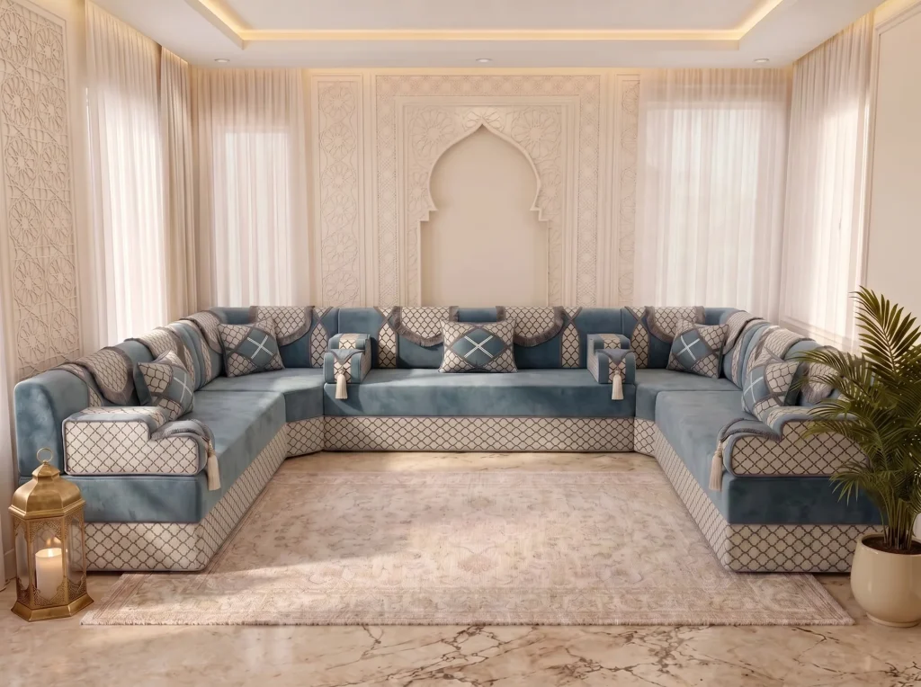 Dusty blue and ivory U-shaped majlis sofa set with trellis-pattern base around a cream rug