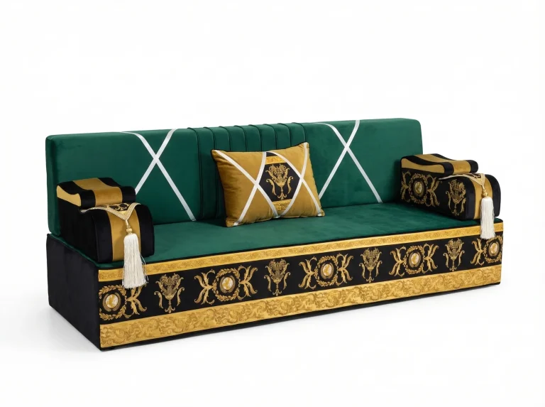 Emerald green velvet Arabic jalsa with a black and gold baroque border, white crossed ribbons and cream tassels