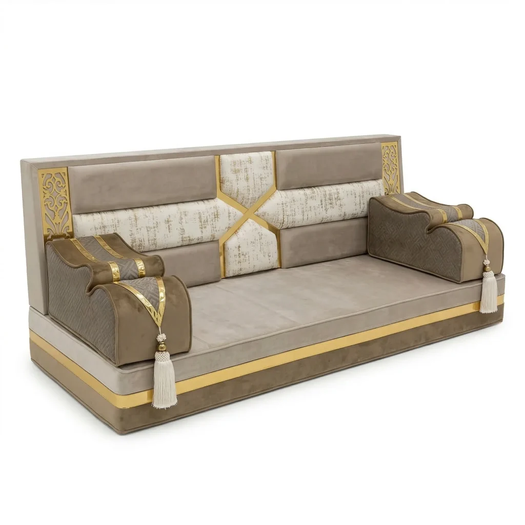 Greige and taupe velvet Arabic majlis unit with a gold cross inlay on the backrest and scrolled tasselled armrests