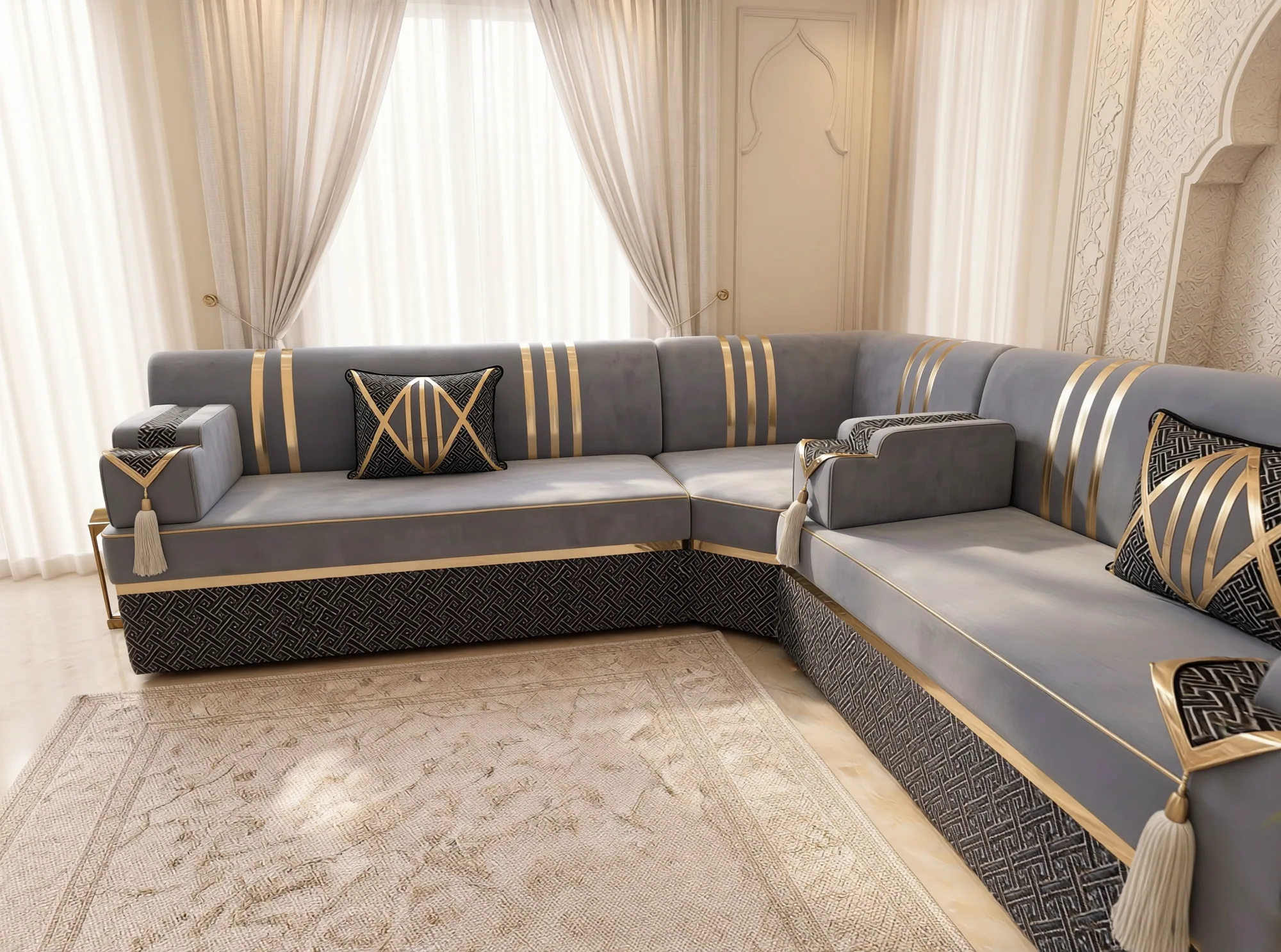 Grey velvet Arabic majlis in an L shape with gold stripes and a black key-pattern base, right side view
