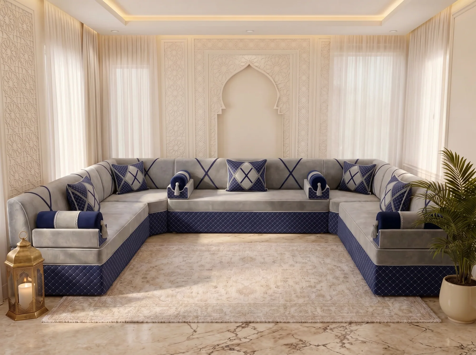 Light grey and navy U-shaped Arabic jalsa with quilted base and five navy cushions around a cream rug