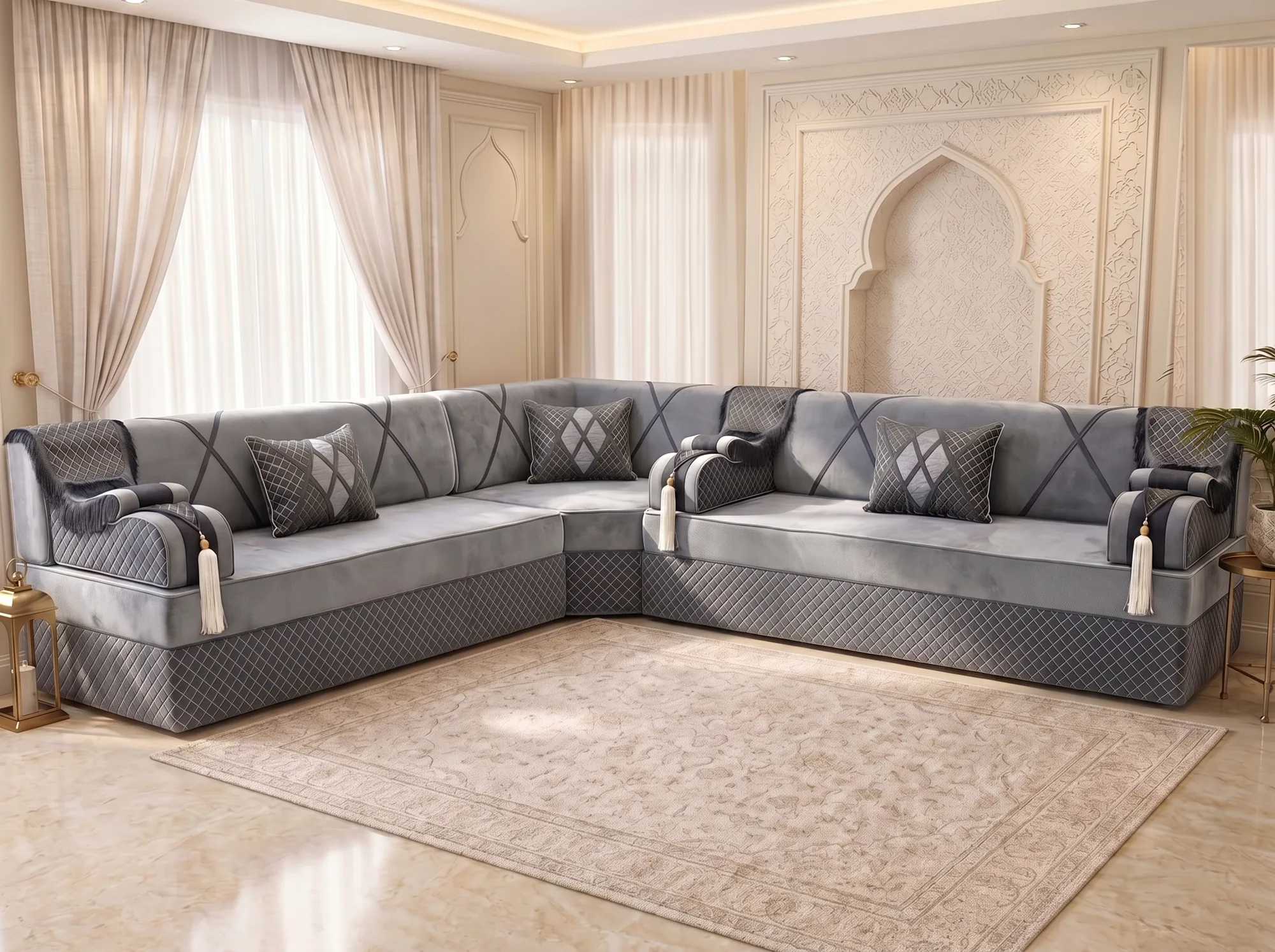 L-shaped grey velvet majlis sofa with a diamond-quilted base and three quilted cushions