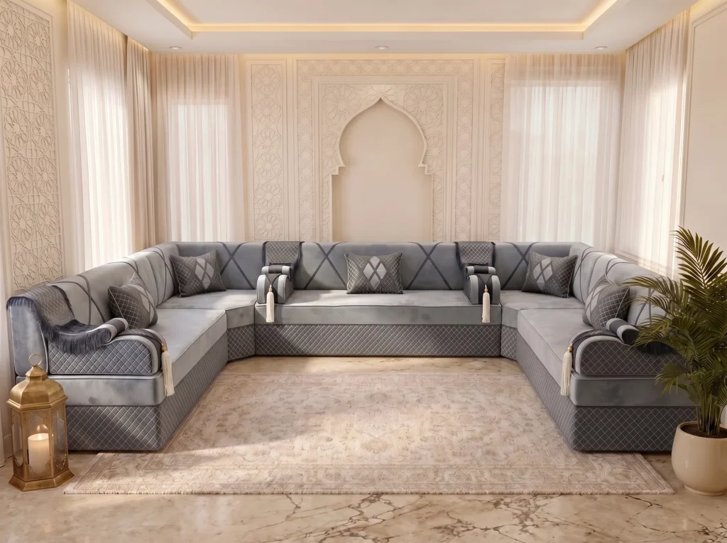 U-shaped grey velvet Arabic majlis with a quilted base and five diamond cushions along three walls