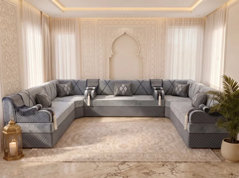 U-shaped grey velvet Arabic majlis with a quilted base and five diamond cushions along three walls