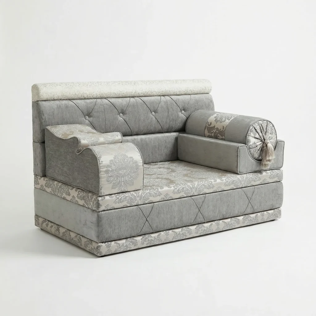 Compact grey chenille majlis sofa with silver damask seat and base band, button-tufted back and a tasselled bolster