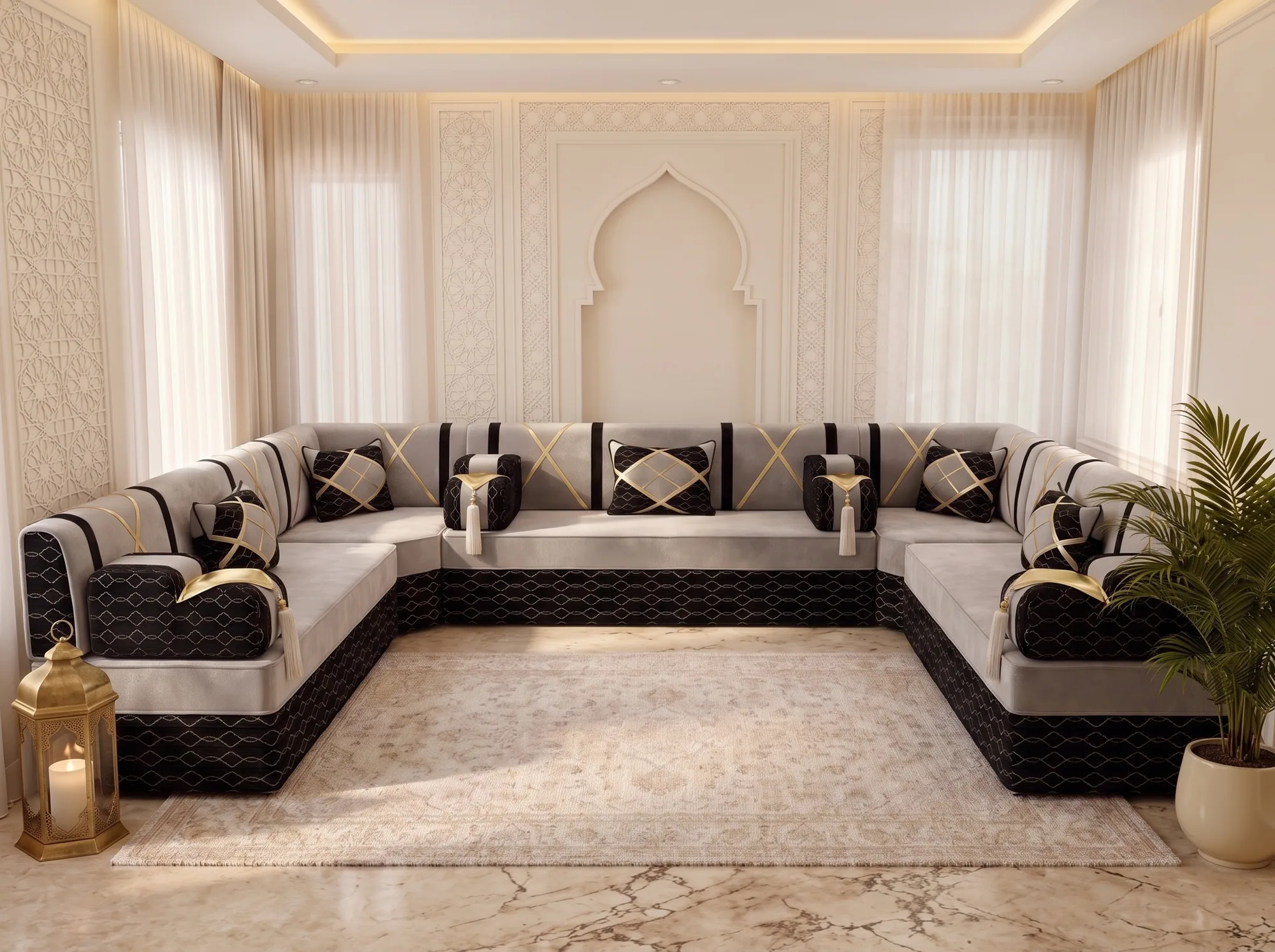 U-shaped light grey and black majlis sofa with gold crossed straps lining three walls around a cream rug