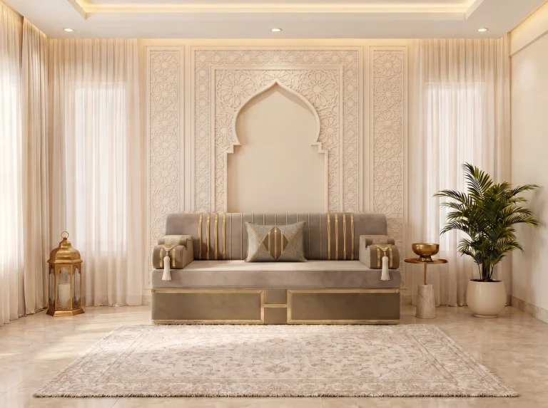 Single beige velvet Arabic majlis module with gold-striped back and tasselled armrests in front of a carved arch wall