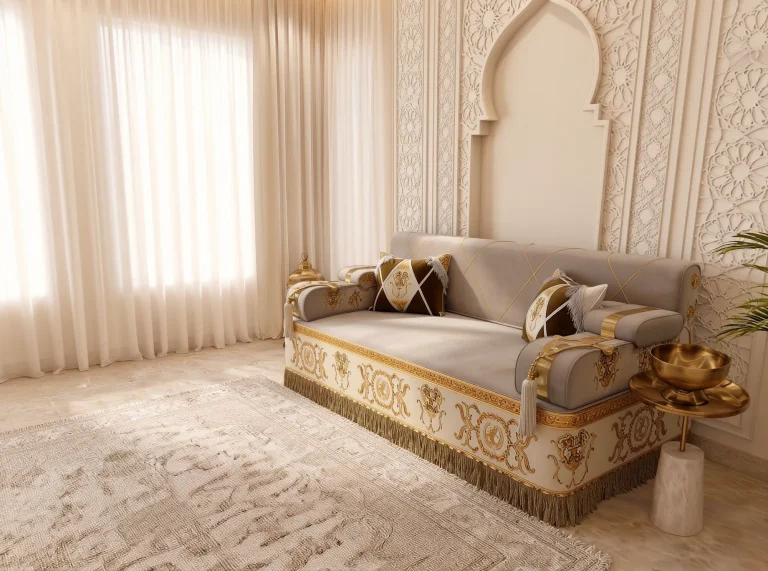 Single beige majlis sofa set module with gold baroque embroidery and fringe, viewed at an angle beside a brass bowl table