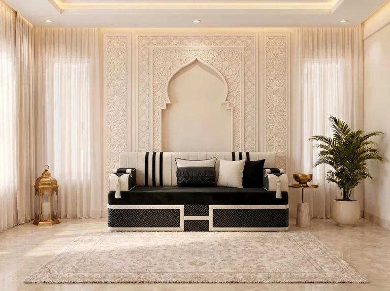Single black velvet majlis sofa module with a cream black-striped back and three pillows, centred before a carved arch