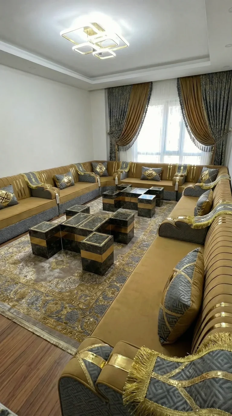 Mustard velvet majlis sofa set with gold-striped backs and grey key-pattern bases around dark marble-effect tables