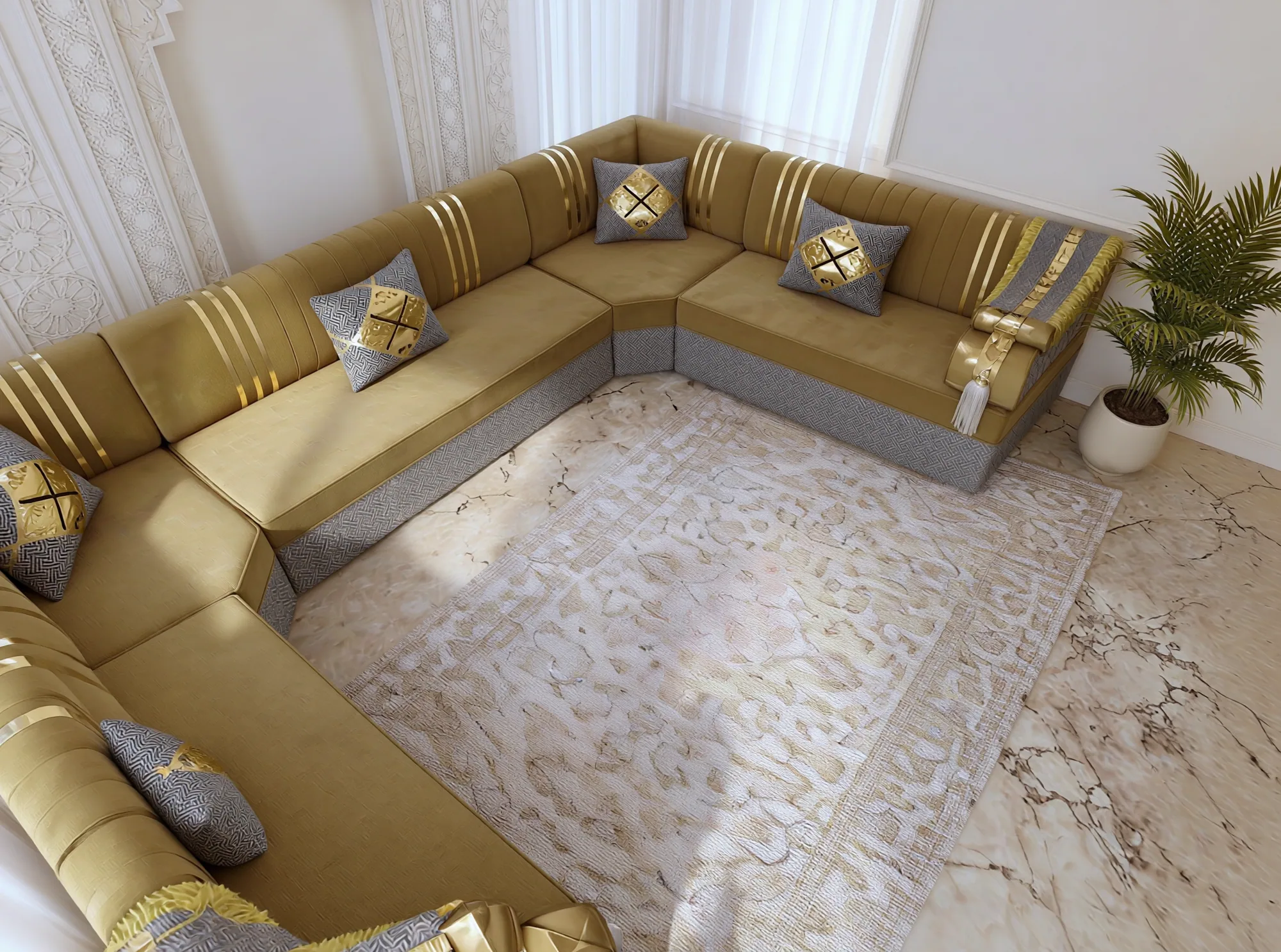 High-angle view of a mustard and grey majlis sofa set wrapping three sides of a cream rug on a marble floor
