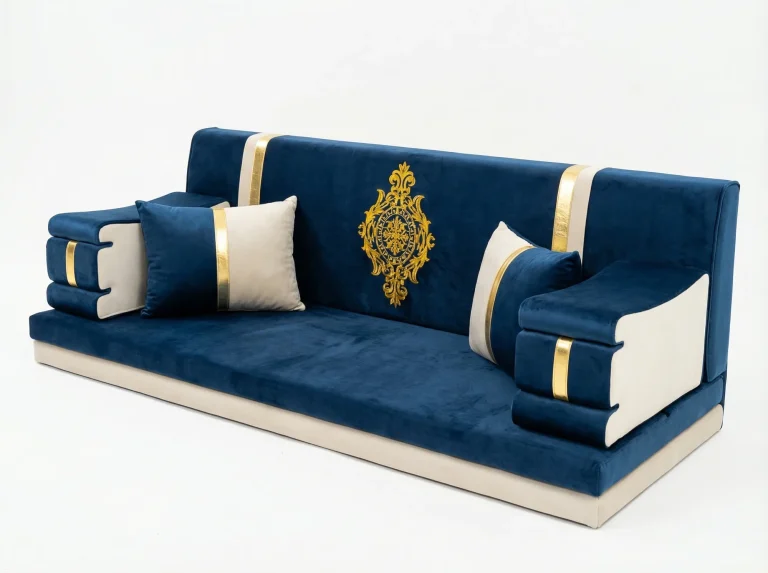 Low navy and cream velvet majlis sofa set piece with a gold embroidered medallion on the backrest and two cushions