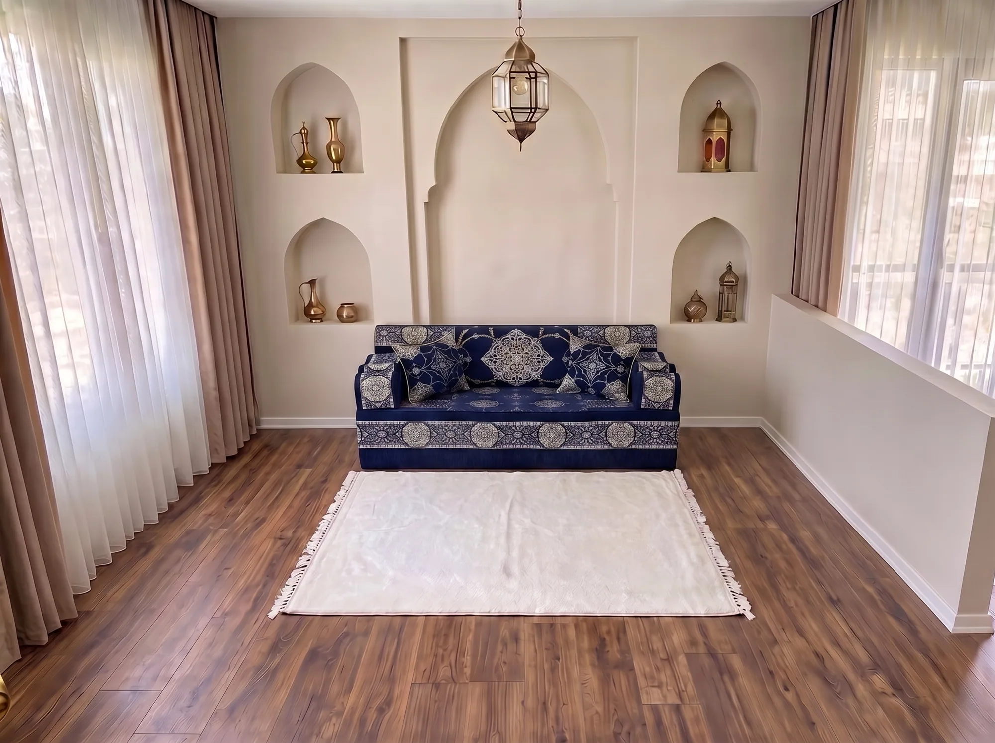 Navy and silver medallion Arabic jalsa in a single row with a white fringed rug laid in front of it