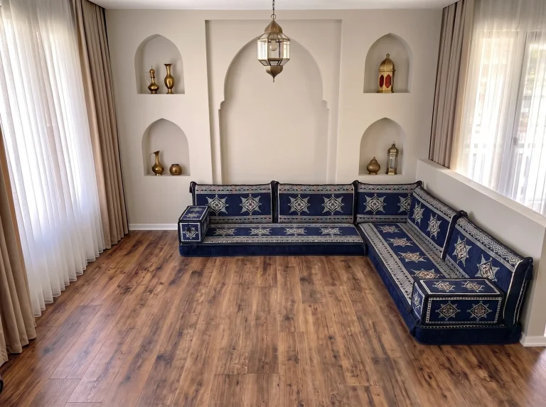 Navy floor sofa set with cream eight-point stars in an L-shaped corner layout on a bare wooden floor