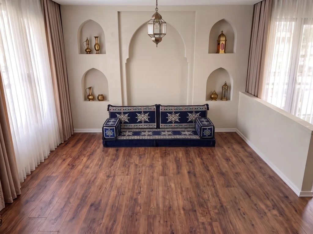 Navy floor sofa set with cream star motifs standing alone against an arched niche wall on a wooden floor
