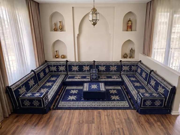 Navy floor seating set with cream stars in a U shape, with a matching star rug and square ottoman at the centre