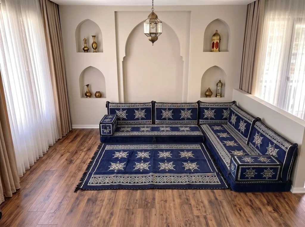 Navy and cream star-pattern floor sofa set in an L shape with a matching fringed star rug on the floor