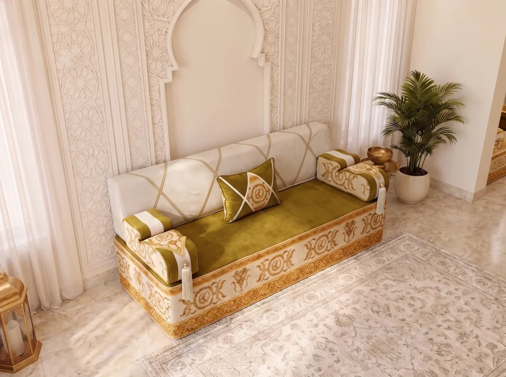 Single olive and ivory majlis seating set with gold baroque base seen from above beside a carved wall
