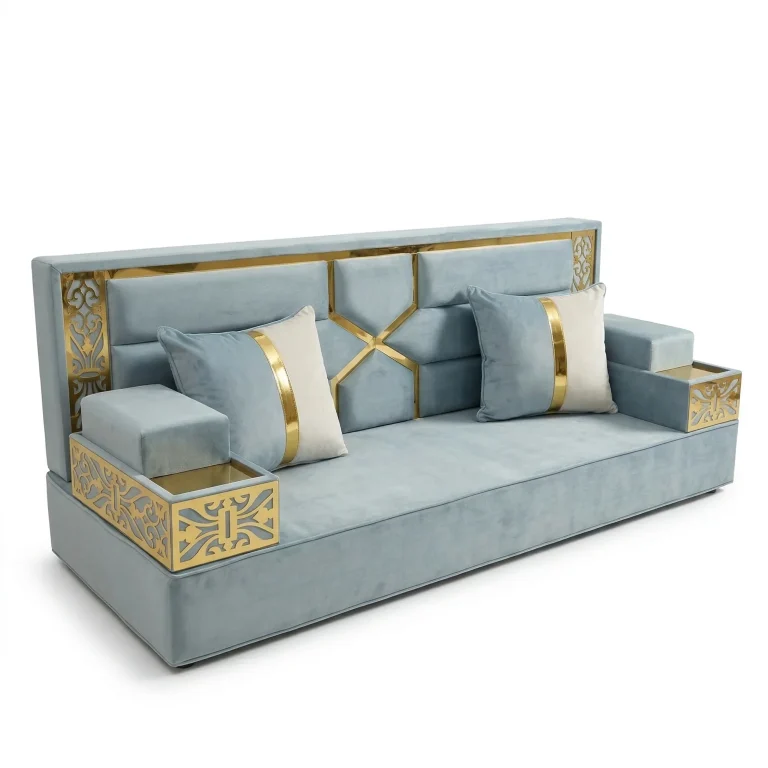 Powder blue velvet majlis seating piece with a gold-framed panelled back and gold laser-cut tray armrests