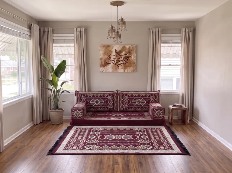 Burgundy and cream kilim single-row Arabic floor sofa with a matching fringed rug in a grey living room