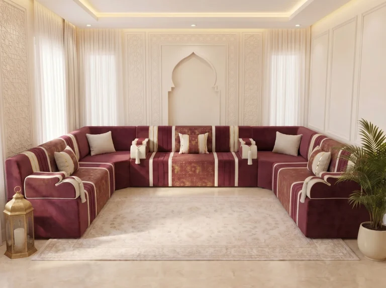 U-shaped rose-burgundy majlis sofa set with cream stripes and cushions facing forward in a cream room