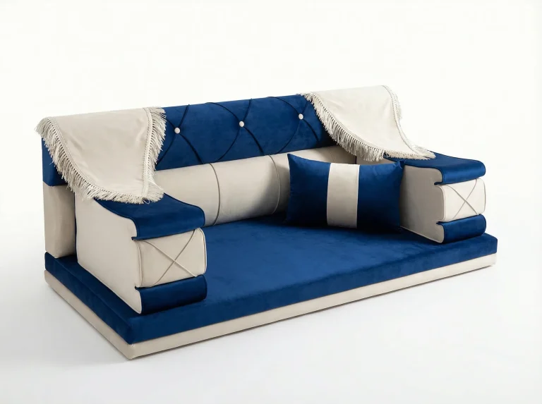 Royal blue and cream velvet Arabic majlis with a pearl-button tufted back and fringed cream armrest throws