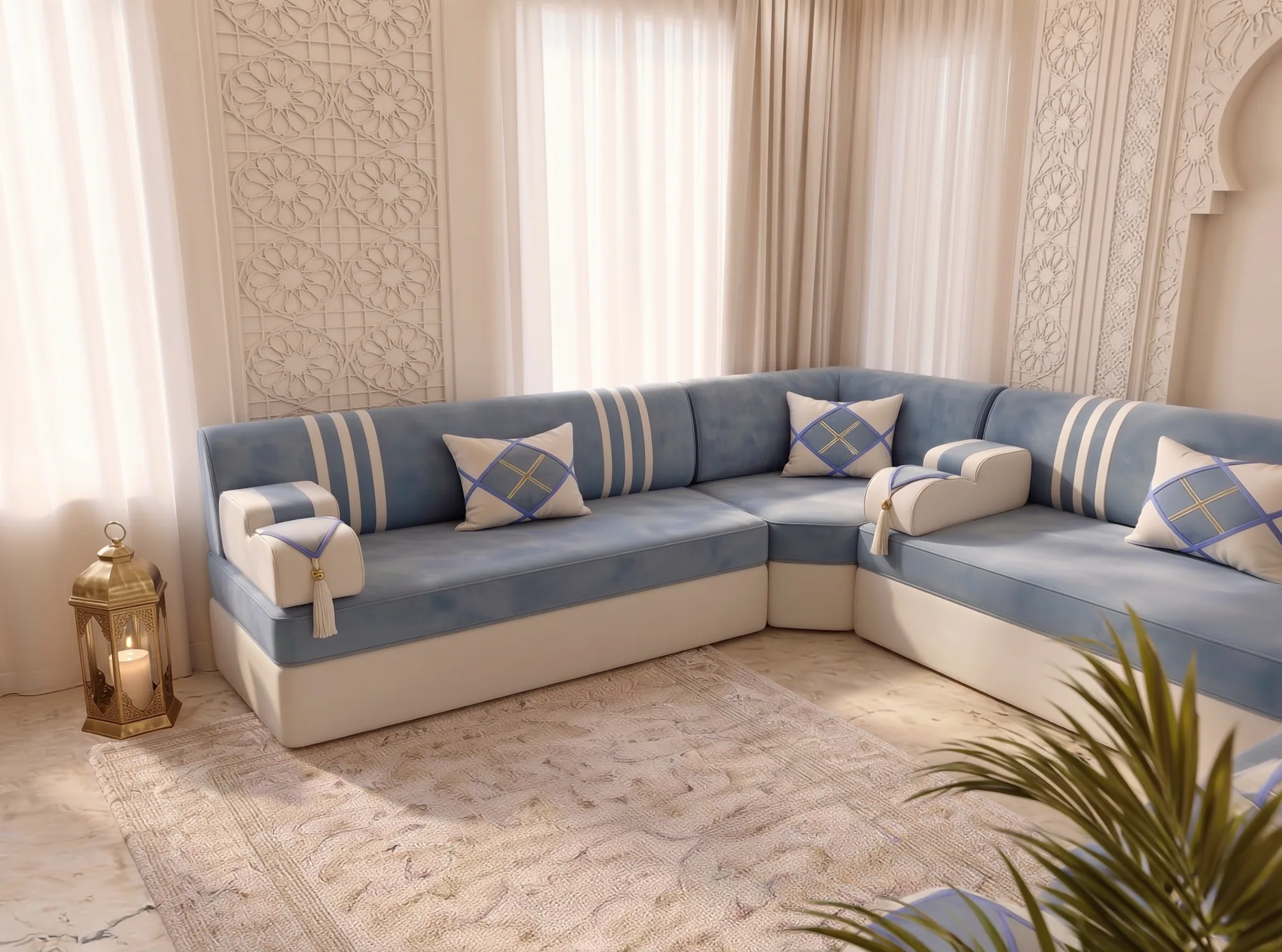 Sky blue and cream majlis sofa set seen across a corner with a brass lantern on the floor and palm in front