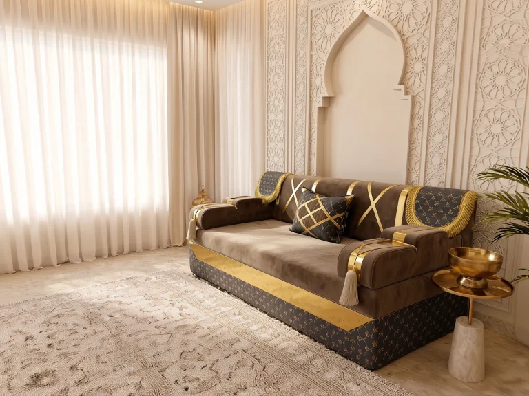 Single taupe velvet majlis seating set with gold bands and tasselled armrests beside sheer curtains