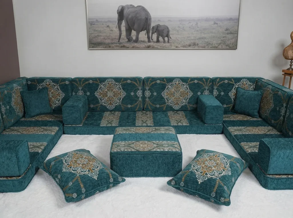 Teal chenille diwan floor sofa in a U shape with gold medallion backs, ottoman and floor cushions