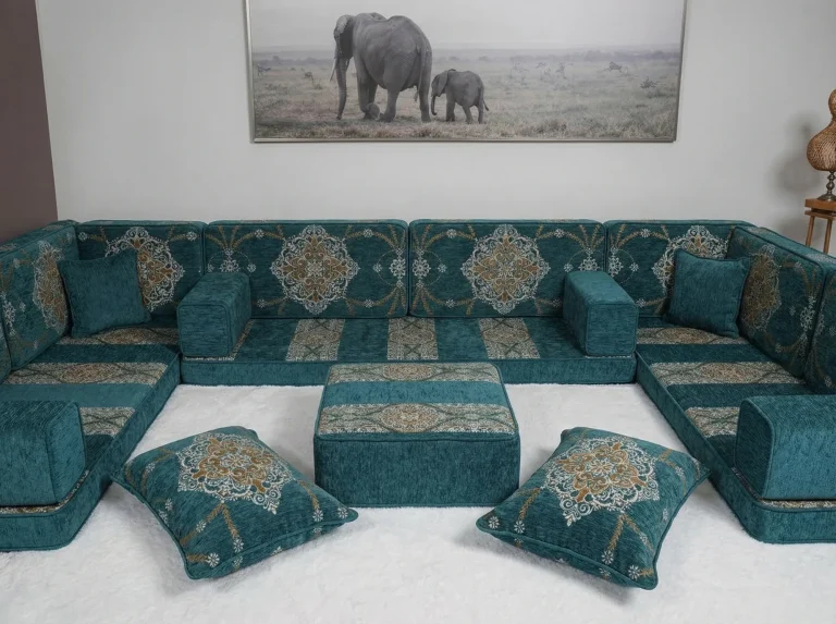 Teal chenille diwan floor sofa in a U shape with gold medallion backs, ottoman and floor cushions