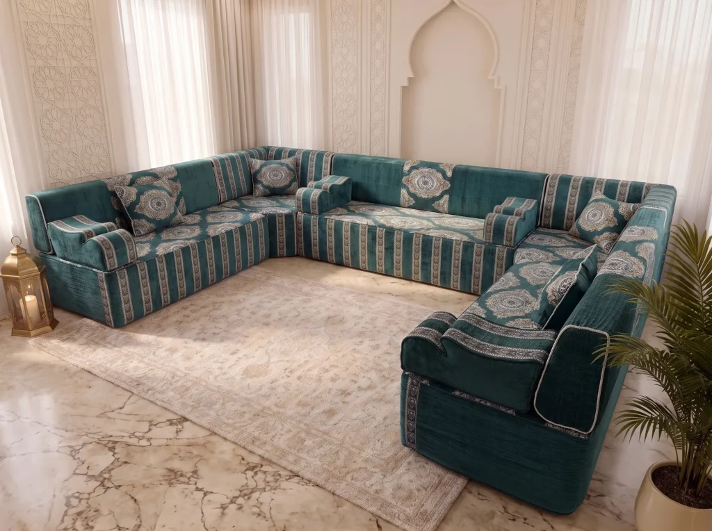 Elevated view of a teal medallion majlis seating set in a U shape, right armrest in the foreground