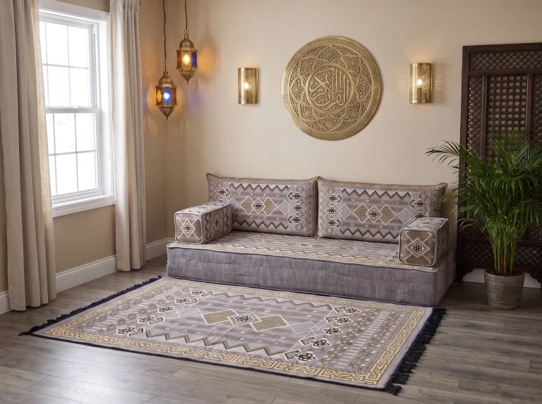 Thick gray and gold kilim-pattern floor sofa set as a single row with a matching kilim rug below a brass wall plate