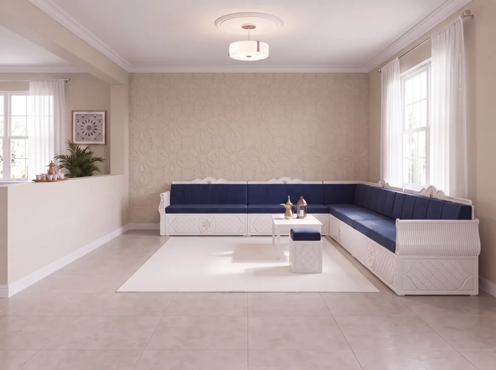 White wooden L-shaped majlis sofa frame with navy velvet cushions, one table and one ottoman